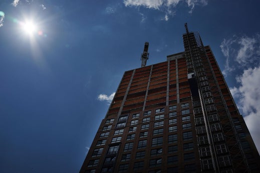 A new building goes up along the Hudson River in New York City. Miles, a character in Andrew Holleran’s new short story, refuses to leave Manhattan, and his last hope for affordable housing is a hotel along the Hudson.